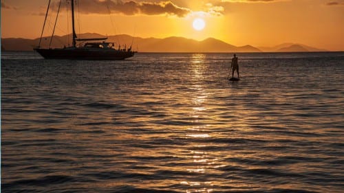paddle board sunset